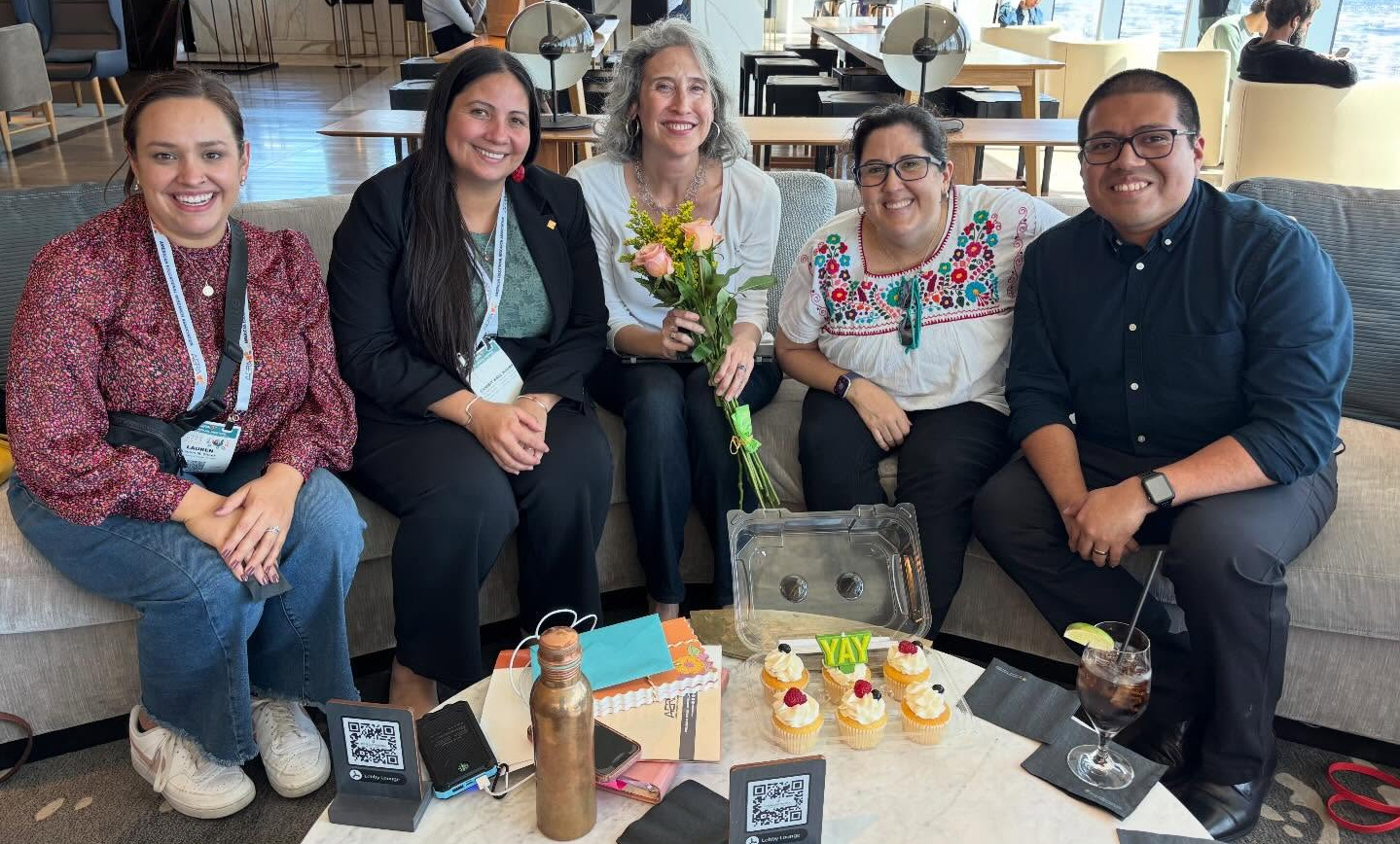 Natalicio Institute researchers in a working meeting at AERA 2026